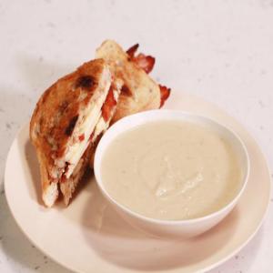 Creamy Apple and Celery Root Soup with Grilled Cheddar, Bacon and Apple Honey Mustard Sandwich image