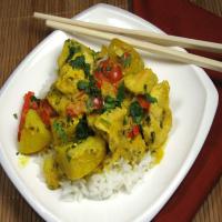 Thai Yellow Chicken Curry With Potatoes and Tomatoes image