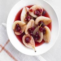 Poached pears in spiced tea image