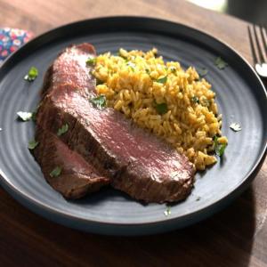 5-Ingredient Marinated Flank Steak with Coconut Curry Rice image