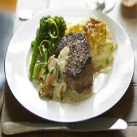 Steak with a rich mushroom and brandy sauce recipe_image