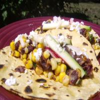Charred Corn Tacos With Zucchini Slaw image