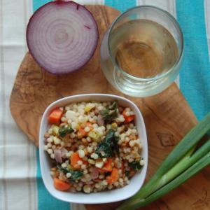 Pearl Couscous with Lentils, Carrots, Spinach, and Corn image