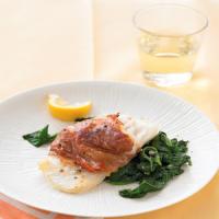 Prosciutto-Wrapped Cod with Lemony Spinach image