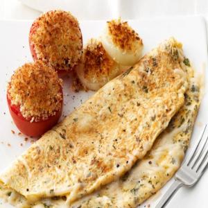 Cheese Omelet With Roasted Tomatoes and Onions image