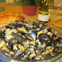 Garlicky Mussels in a Rich Lemon, Fresh Herb, Butter Sauce image