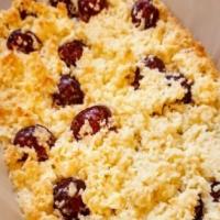 Easy chocolate, coconut and cherry bake image