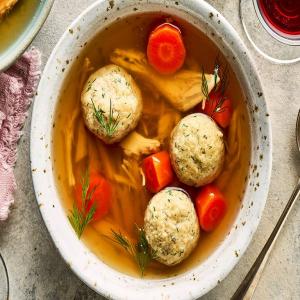 Jewish chicken soup with horseradish dill matzo balls image