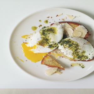 Poached Eggs and Parmesan Cheese Over Toasted Brioche with Pistou_image