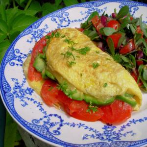 Avocado, Cheddar, and Tomato Omelet image