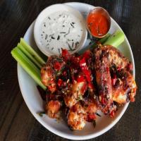 Roasted Chicken Wings Marinated in Calabrian Chile Sauce image