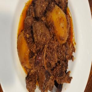 Blackened Curried Goat With Potatoes Recipe by Tasty_image