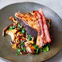 Red wine poached halibut with bacon & mushrooms image