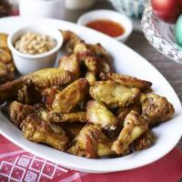 Spicy satay wings with peanut sauce image