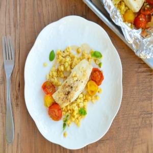5-Ingredient Grilled Halibut Pouches with Corn and Tomatoes image