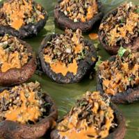 Grilled Portobellos Filled with Wild Rice-Almond Pilaf and Piquillo Pepper Vinaigrette image