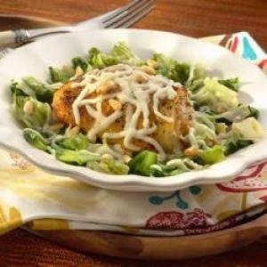 Roasted Chicken Thighs over Braised Escarole with Pine Nuts and Mozzarella image