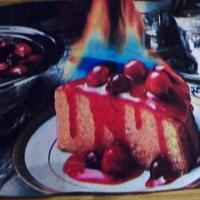 Flaming Cherries Jubilee Rum Cake image