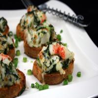 Garlic Bread Topped With Crab Meat and Spinach_image