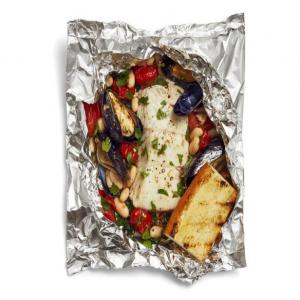 Foil-Packet Seafood with Beans and Kale image