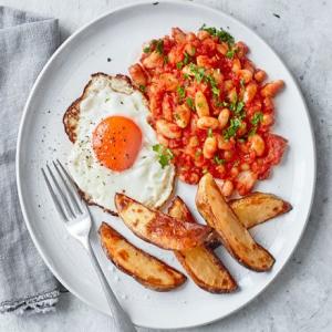 Posh egg, chips & beans image