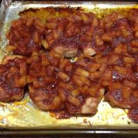 Bacon Wrapped Pork Chops in Zesty Sauce image