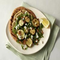 Roasted Zucchini Flatbread with Hummus, Arugula, Goat Cheese, and Almonds image