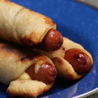 Cheesy Camping Hot Dogs Recipe by Tasty image