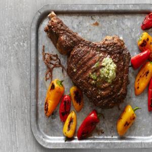 Rib-Eye Steak With Herb Butter and Charred Peppers_image