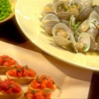 Braised Clams in Parsley Broth, Peas and Bruschetta with Tomatoes and Fried Capers image