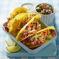 Grilled salmon tacos with avocado salsa image