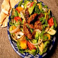 Spicy Lamb Sausage With Grilled Onions and Zucchini_image