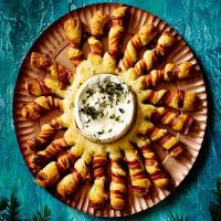 Baked camembert with bacon-wrapped breadsticks image