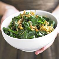 Spinach with onions & pine nuts image