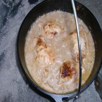 Easy baked chicken and rice in the Dutch oven image