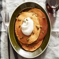 Pumpkin Pancakes with Maple Syrup and Nutmeg Whipped Cream image