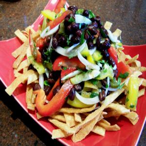 Peppers and Black Beans on a Bed of Crunchy Tortilla Strips_image