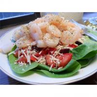 Greek-Style Shrimp Salad on a Bed of Baby Spinach_image
