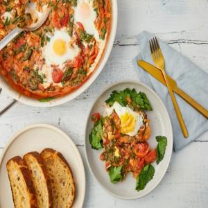 Skillet-Baked Eggs in Tomato Gravy with Spinach image