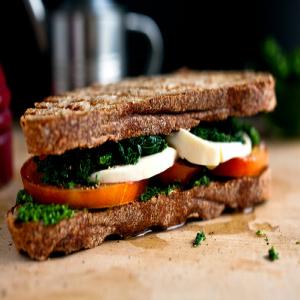 Tomato, Kale and Mozzarella Sandwich With Parsley Pesto image
