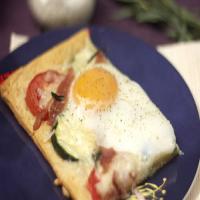 Cheesy Baked Egg Tart with Tarragon, Tomato and Zucchini image