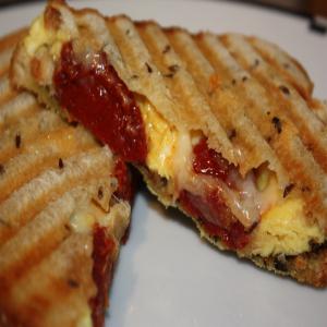 Panini With Scrambled Eggs and Tomatoes image