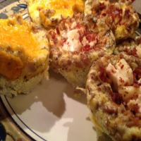 Scrambled Egg Muffins With Bacon and Swiss Cheese image