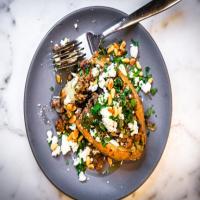Roasted Sweet Potatoes Topped with Spiced Ground Beef and Pine Nuts image