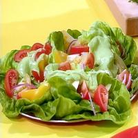 Mexican Salad with Tomatoes, Red Onions and Avocado Dressing image