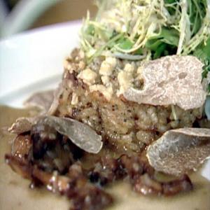 Mushroom Risotto Cakes Stuffed with Duck Liver, Petit Greens, and White Truffles_image
