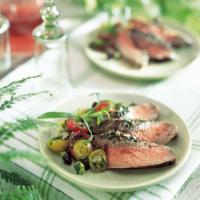 Herb-Crusted Flank Steak with Cherry Tomatoes and Olives image