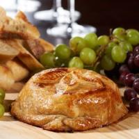 Baked Brie with Raspberry Jam, Almonds, & Cranberries Recipe - (4.7/5)_image