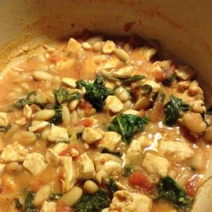 Chicken and Tomato Stew with Arugula and Cannellini image