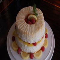 Lemon Angel Food Cake Filled With Lemon Curd and Fresh Raspberry image